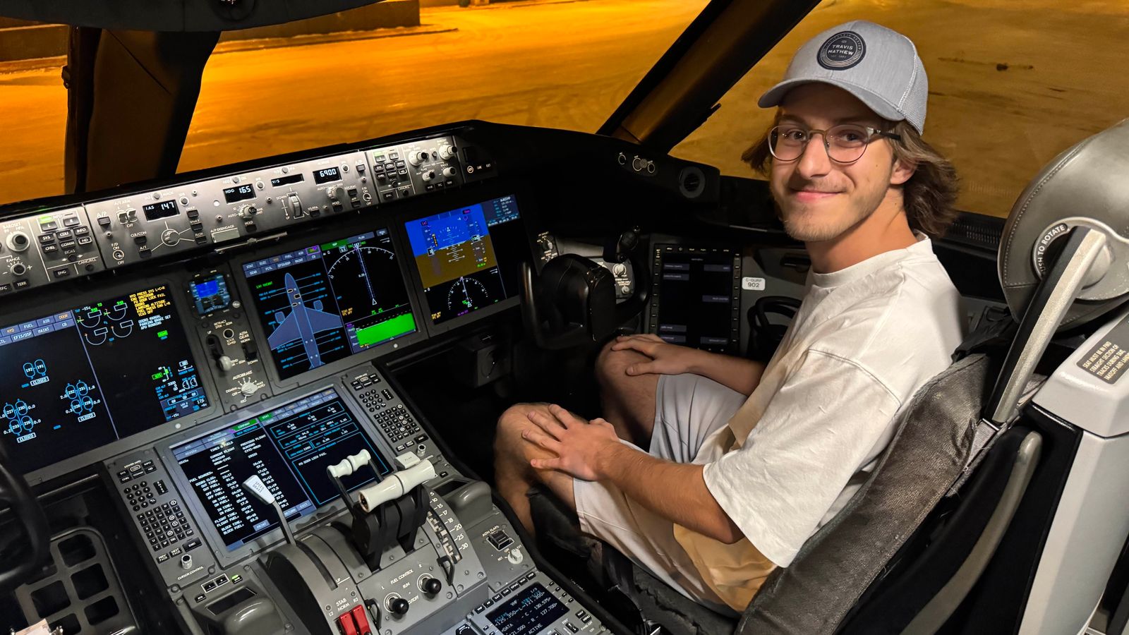 Daniel Berg in the flight deck of a WestJet Boeing 787-9 Dreamliner